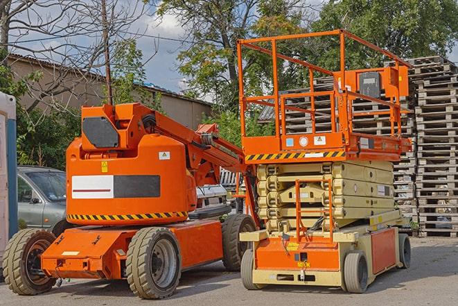 forklift transporting boxes in a busy warehouse in Pacheco, CA